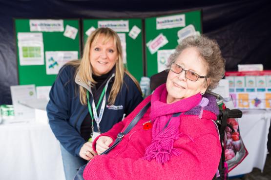 Healthwatch Volunteer and older lady smiling