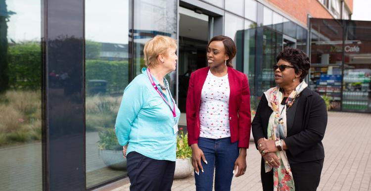 Three ladies talking