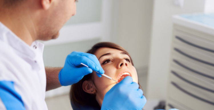 Woman having dental examination