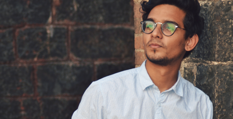 young man looking away from camera