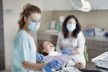 Dentist treating a patient