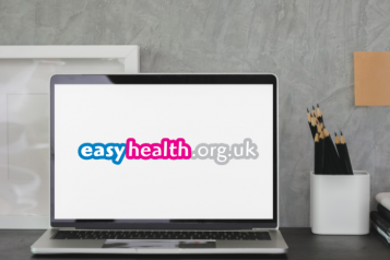 Computer with Easy Health logo on screen