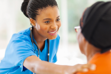 Nurse smiling at patient