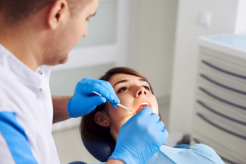 Woman having dental examination