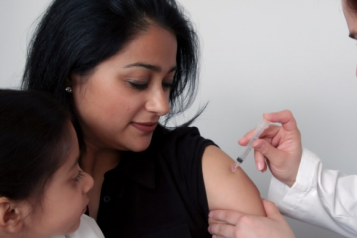 lady receiving vaccine