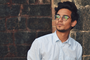 young man looking away from camera