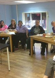 Group of volunteers with learning disabilities taking part in a training session